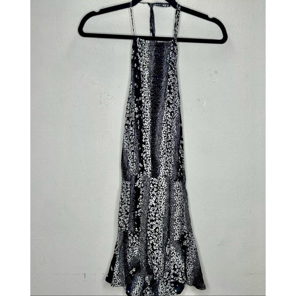 Olivaceous Black and White Floral Halter Tie Neck Open Back Flowy Romper Medium